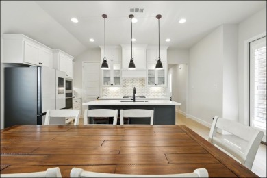 Discover the epitome of lakeside living in this stunning Perry on The Tribute At the Colony in Texas - for sale on GolfHomes.com, golf home, golf lot