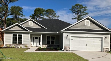 Welcome to your dream home at 1307 Mona Passage Court in the on Harbour Point Golf Club in North Carolina - for sale on GolfHomes.com, golf home, golf lot