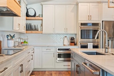 Discover luxury coastal living at its finest in this fully on Apollo Beach Golf and Sea Club in Florida - for sale on GolfHomes.com, golf home, golf lot