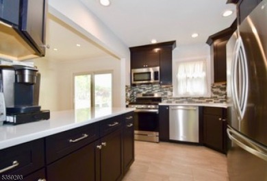IMPRESSSIVE updated 3 bedroom, 1.1 bath BEAUTIFUL split situated on Baltusrol Golf Club in New Jersey - for sale on GolfHomes.com, golf home, golf lot
