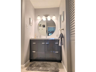 This sunny 2nd Floor condo turnkey furnished, has been remodeled on The Meadows Golf and Country Club in Florida - for sale on GolfHomes.com, golf home, golf lot