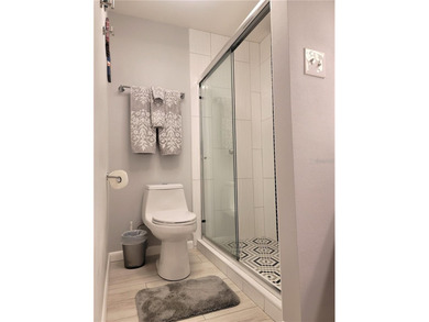 This sunny 2nd Floor condo turnkey furnished, has been remodeled on The Meadows Golf and Country Club in Florida - for sale on GolfHomes.com, golf home, golf lot