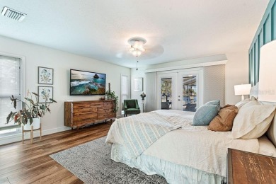 Discover luxury coastal living at its finest in this fully on Apollo Beach Golf and Sea Club in Florida - for sale on GolfHomes.com, golf home, golf lot