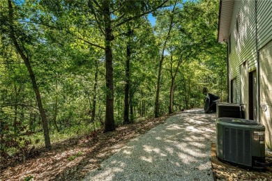 Tucked away in a quiet cul-de-sac near the Highlands & Scotsdale on Branchwood Golf Course in Arkansas - for sale on GolfHomes.com, golf home, golf lot