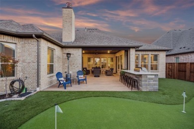 One bedroom is currently an office with French doors, the plan on The Tribute At the Colony in Texas - for sale on GolfHomes.com, golf home, golf lot