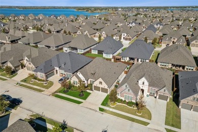 One bedroom is currently an office with French doors, the plan on The Tribute At the Colony in Texas - for sale on GolfHomes.com, golf home, golf lot