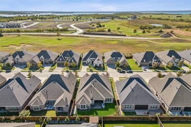 One bedroom is currently an office with French doors, the plan on The Tribute At the Colony in Texas - for sale on GolfHomes.com, golf home, golf lot