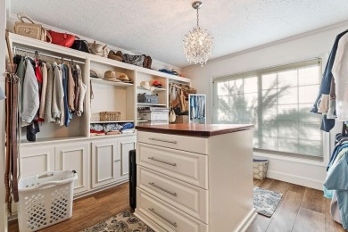 Discover luxury coastal living at its finest in this fully on Apollo Beach Golf and Sea Club in Florida - for sale on GolfHomes.com, golf home, golf lot