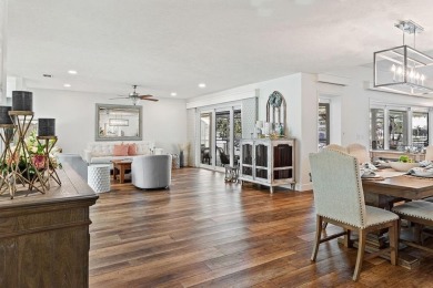Discover luxury coastal living at its finest in this fully on Apollo Beach Golf and Sea Club in Florida - for sale on GolfHomes.com, golf home, golf lot