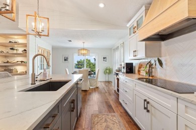 Discover luxury coastal living at its finest in this fully on Apollo Beach Golf and Sea Club in Florida - for sale on GolfHomes.com, golf home, golf lot