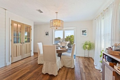 Discover luxury coastal living at its finest in this fully on Apollo Beach Golf and Sea Club in Florida - for sale on GolfHomes.com, golf home, golf lot