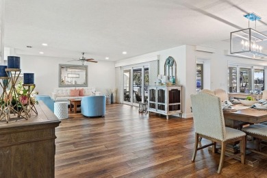 Discover luxury coastal living at its finest in this fully on Apollo Beach Golf and Sea Club in Florida - for sale on GolfHomes.com, golf home, golf lot