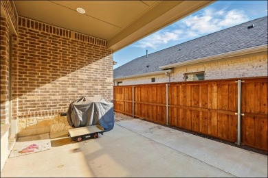 Discover the epitome of lakeside living in this stunning Perry on The Tribute At the Colony in Texas - for sale on GolfHomes.com, golf home, golf lot