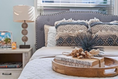 Discover luxury coastal living at its finest in this fully on Apollo Beach Golf and Sea Club in Florida - for sale on GolfHomes.com, golf home, golf lot