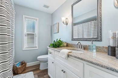 Discover luxury coastal living at its finest in this fully on Apollo Beach Golf and Sea Club in Florida - for sale on GolfHomes.com, golf home, golf lot