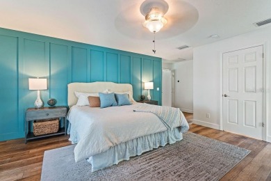 Discover luxury coastal living at its finest in this fully on Apollo Beach Golf and Sea Club in Florida - for sale on GolfHomes.com, golf home, golf lot