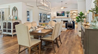 Discover luxury coastal living at its finest in this fully on Apollo Beach Golf and Sea Club in Florida - for sale on GolfHomes.com, golf home, golf lot
