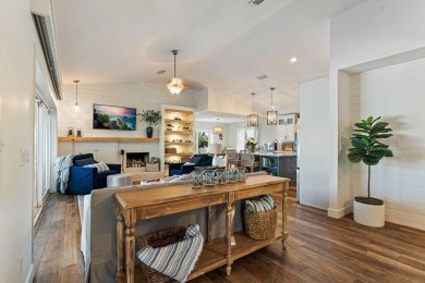 Discover luxury coastal living at its finest in this fully on Apollo Beach Golf and Sea Club in Florida - for sale on GolfHomes.com, golf home, golf lot