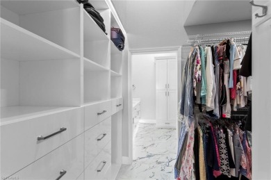 Experience refined Naples living in this beautifully maintained on The Club At Strand in Florida - for sale on GolfHomes.com, golf home, golf lot