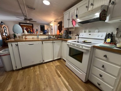 Hidden Golf Club lot 860 2 bedroom 1.5 bath 784 Sq FT listed for on Lake Henry Golf Club in Florida - for sale on GolfHomes.com, golf home, golf lot