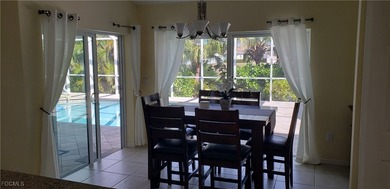 METICULOUS MAINTAINED POOL HOME. FURNISHED with 3bed, 2 bath and on Palmetto-Pine Country Club in Florida - for sale on GolfHomes.com, golf home, golf lot