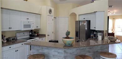 METICULOUS MAINTAINED POOL HOME. FURNISHED with 3bed, 2 bath and on Palmetto-Pine Country Club in Florida - for sale on GolfHomes.com, golf home, golf lot