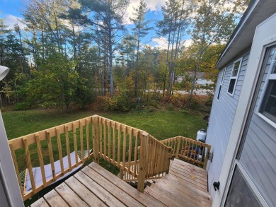 This 2003 raised ranch in Hermon offers a blend of modern on Hermon Meadow Golf Club in Maine - for sale on GolfHomes.com, golf home, golf lot