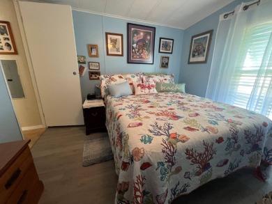 Hidden Golf Club lot 860 2 bedroom 1.5 bath 784 Sq FT listed for on Lake Henry Golf Club in Florida - for sale on GolfHomes.com, golf home, golf lot