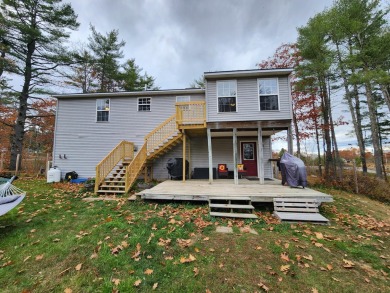 This 2003 raised ranch in Hermon offers a blend of modern on Hermon Meadow Golf Club in Maine - for sale on GolfHomes.com, golf home, golf lot