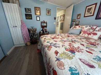 Hidden Golf Club lot 860 2 bedroom 1.5 bath 784 Sq FT listed for on Lake Henry Golf Club in Florida - for sale on GolfHomes.com, golf home, golf lot
