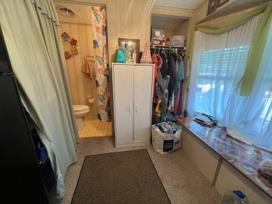 Hidden Golf Club lot 860 2 bedroom 1.5 bath 784 Sq FT listed for on Lake Henry Golf Club in Florida - for sale on GolfHomes.com, golf home, golf lot