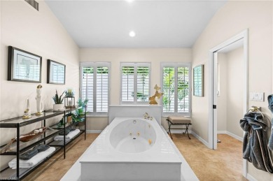 Rarely available Estate Home with Water and Golf Views available on Estero Country Club in Florida - for sale on GolfHomes.com, golf home, golf lot