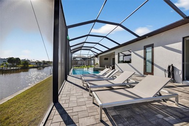 PRIME WATERFRONT IN CAPE CORAL! CONTEMPORARY 3 BEDROOM PLUS DEN on Burnt Store Golf Club in Florida - for sale on GolfHomes.com, golf home, golf lot