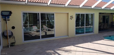 METICULOUS MAINTAINED POOL HOME. FURNISHED with 3bed, 2 bath and on Palmetto-Pine Country Club in Florida - for sale on GolfHomes.com, golf home, golf lot