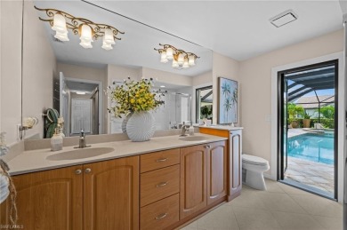 Rarely available Estate Home with Water and Golf Views available on Estero Country Club in Florida - for sale on GolfHomes.com, golf home, golf lot