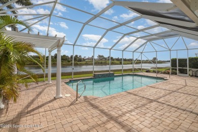 ''Stunning  retreat with a sparkling pool, waterfall, lushly on Duran Golf Course in Florida - for sale on GolfHomes.com, golf home, golf lot