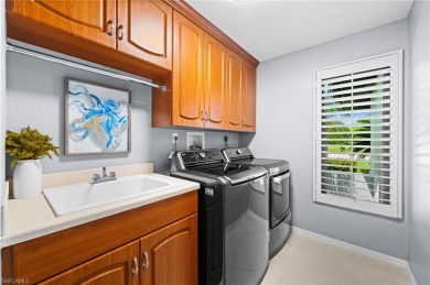 Rarely available Estate Home with Water and Golf Views available on Estero Country Club in Florida - for sale on GolfHomes.com, golf home, golf lot