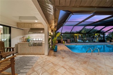 Rarely available Estate Home with Water and Golf Views available on Estero Country Club in Florida - for sale on GolfHomes.com, golf home, golf lot