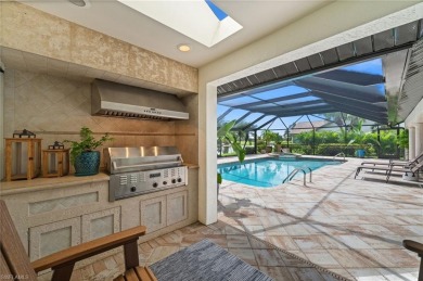 Rarely available Estate Home with Water and Golf Views available on Estero Country Club in Florida - for sale on GolfHomes.com, golf home, golf lot