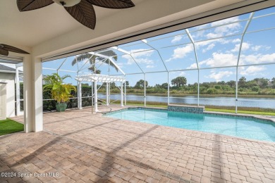 ''Stunning  retreat with a sparkling pool, waterfall, lushly on Duran Golf Course in Florida - for sale on GolfHomes.com, golf home, golf lot