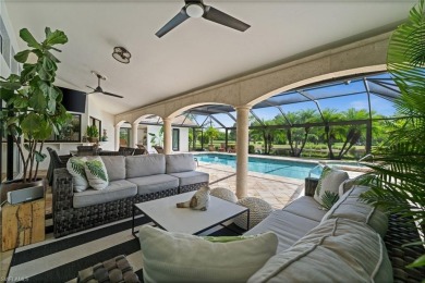 Rarely available Estate Home with Water and Golf Views available on Estero Country Club in Florida - for sale on GolfHomes.com, golf home, golf lot