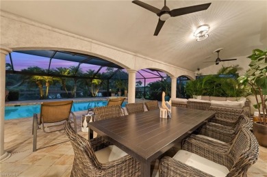 Rarely available Estate Home with Water and Golf Views available on Estero Country Club in Florida - for sale on GolfHomes.com, golf home, golf lot