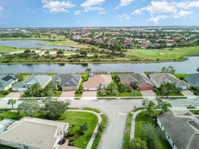 ''Stunning  retreat with a sparkling pool, waterfall, lushly on Duran Golf Course in Florida - for sale on GolfHomes.com, golf home, golf lot