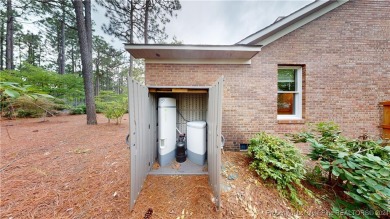 Immerse yourself in the serenity of the pine forest with this on Pinehurst Resort and Country Club in North Carolina - for sale on GolfHomes.com, golf home, golf lot