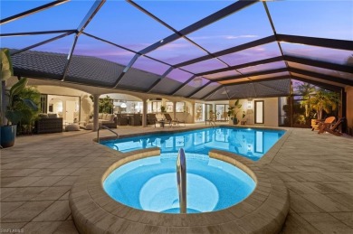 Rarely available Estate Home with Water and Golf Views available on Estero Country Club in Florida - for sale on GolfHomes.com, golf home, golf lot