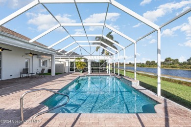 ''Stunning  retreat with a sparkling pool, waterfall, lushly on Duran Golf Course in Florida - for sale on GolfHomes.com, golf home, golf lot