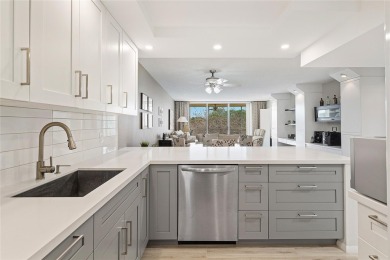 Welcome HOME to this updated corner unit with an open-concept on Palm-Aire Country Club and Resort - The Oaks in Florida - for sale on GolfHomes.com, golf home, golf lot