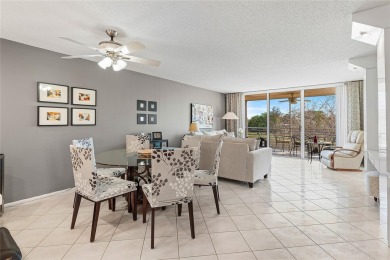 Welcome HOME to this updated corner unit with an open-concept on Palm-Aire Country Club and Resort - The Oaks in Florida - for sale on GolfHomes.com, golf home, golf lot