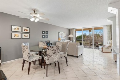 Welcome HOME to this updated corner unit with an open-concept on Palm-Aire Country Club and Resort - The Oaks in Florida - for sale on GolfHomes.com, golf home, golf lot