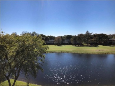 Welcome HOME to this updated corner unit with an open-concept on Palm-Aire Country Club and Resort - The Oaks in Florida - for sale on GolfHomes.com, golf home, golf lot